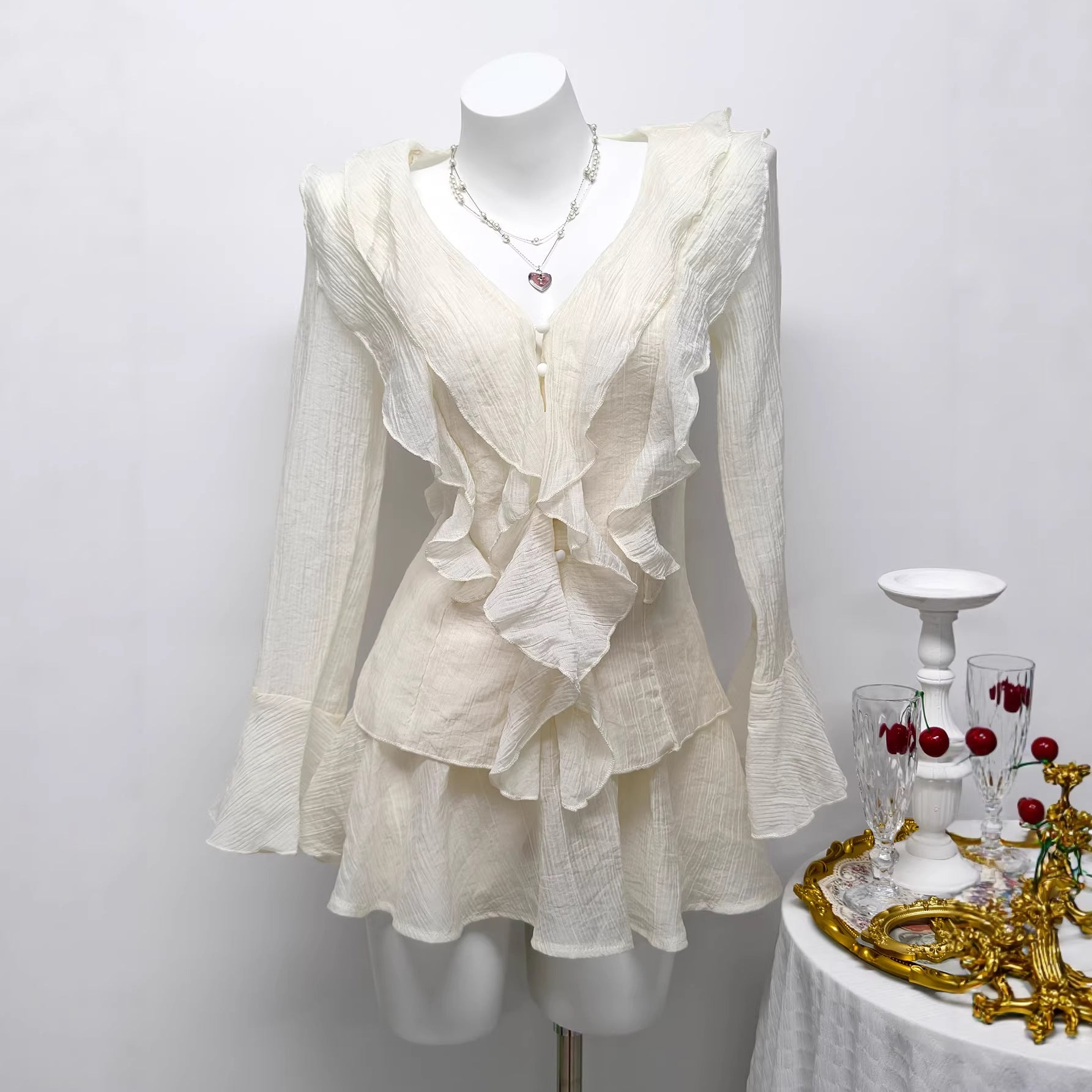 Long sleeved V-neck short skirt pants set