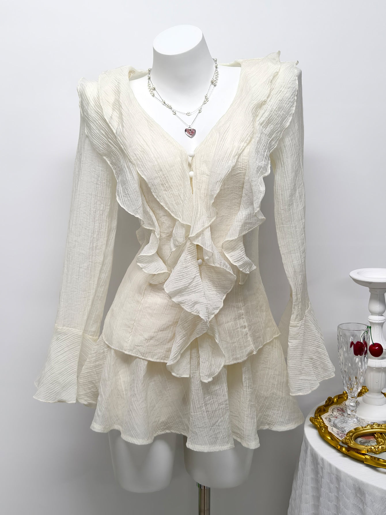 Long sleeved V-neck short skirt pants set